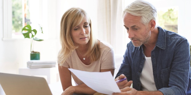 Couple reviewing document for estate planning