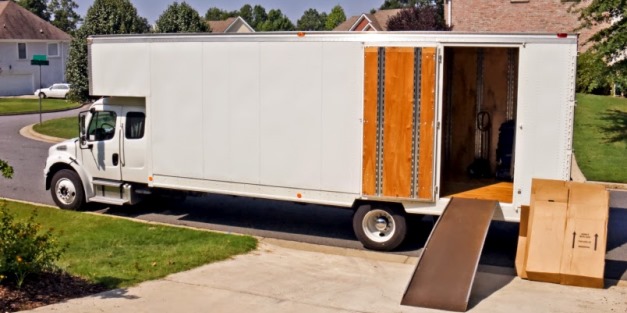 White Moving Truck unloading