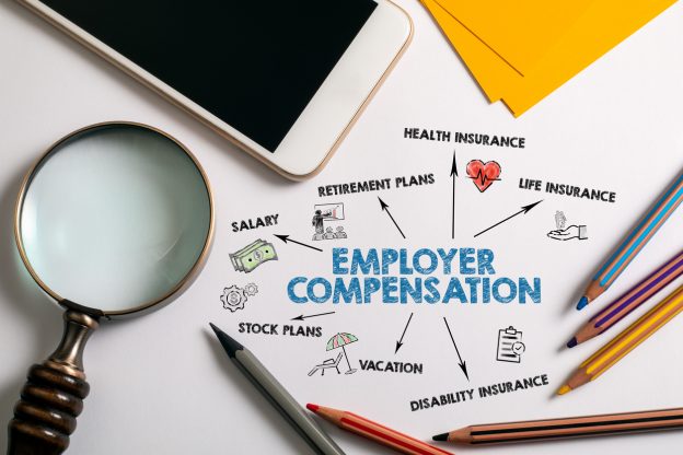 Magnifying glass looking at the different employer compensation costs