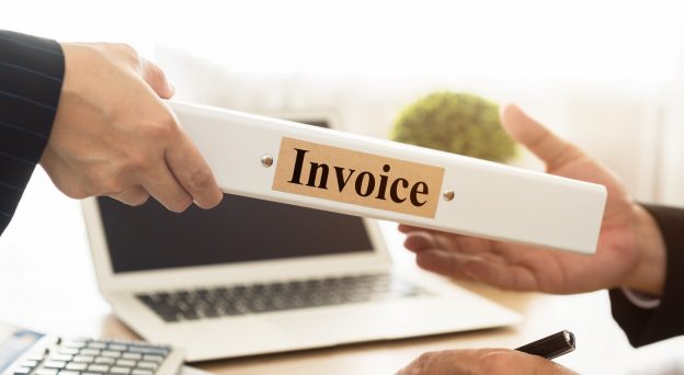 Passing a binder with 'invoices' on it from one person to another