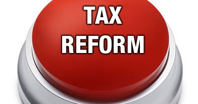 Big red button saying tax reform