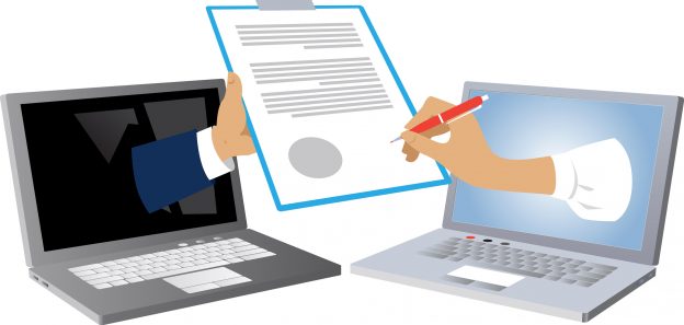 Hands signing through computer showing digital electronic signature