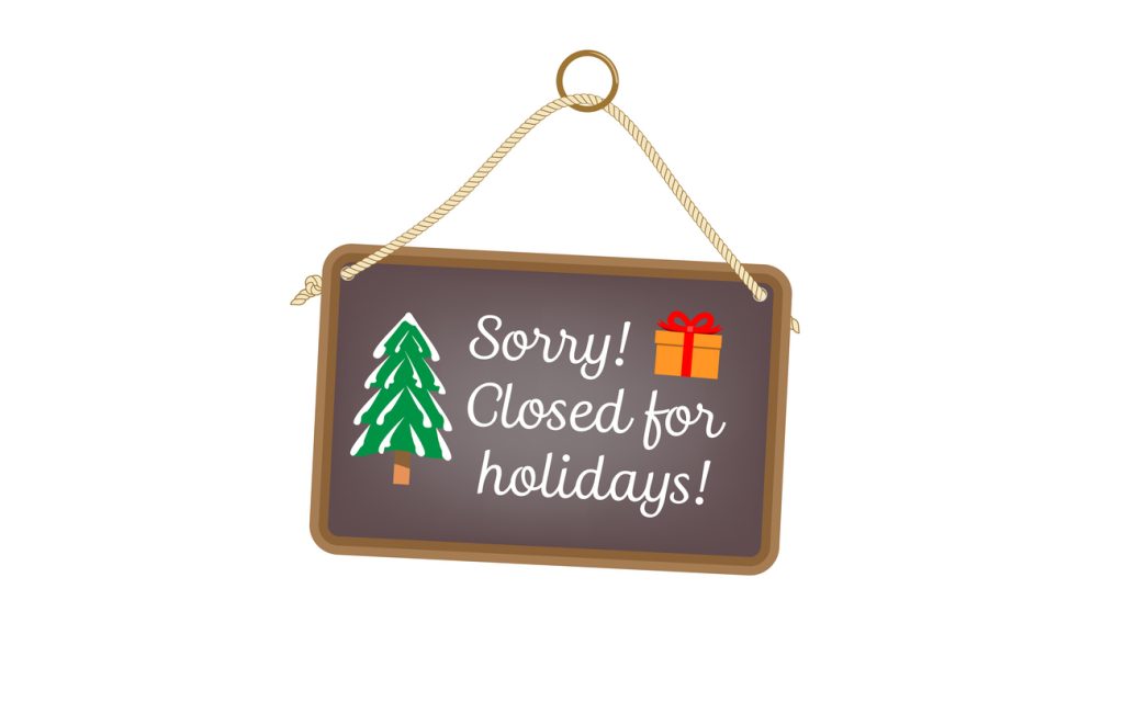 Illustration of a hand written sign saying closed for the holidays